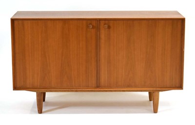 Lot 22 - A 1960's teak two-door cabinet with a beech...
