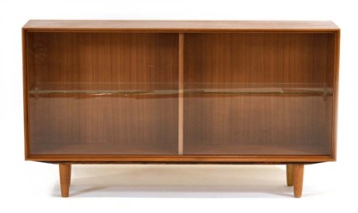 Lot 27 - A Danish teak bookcase with a pair of glazed...
