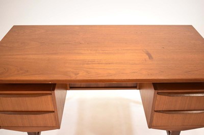 Lot 41 - A 1960's Danish teak and crossbanded desk, the...