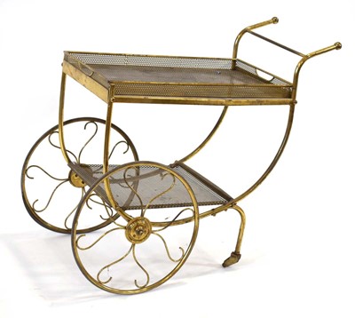 Lot 89 - A 1970's perforated brass trolley with two...