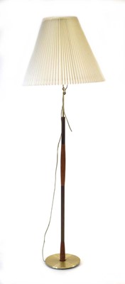 Lot 137 - A 1960's Danish teak standard lamp with brass...